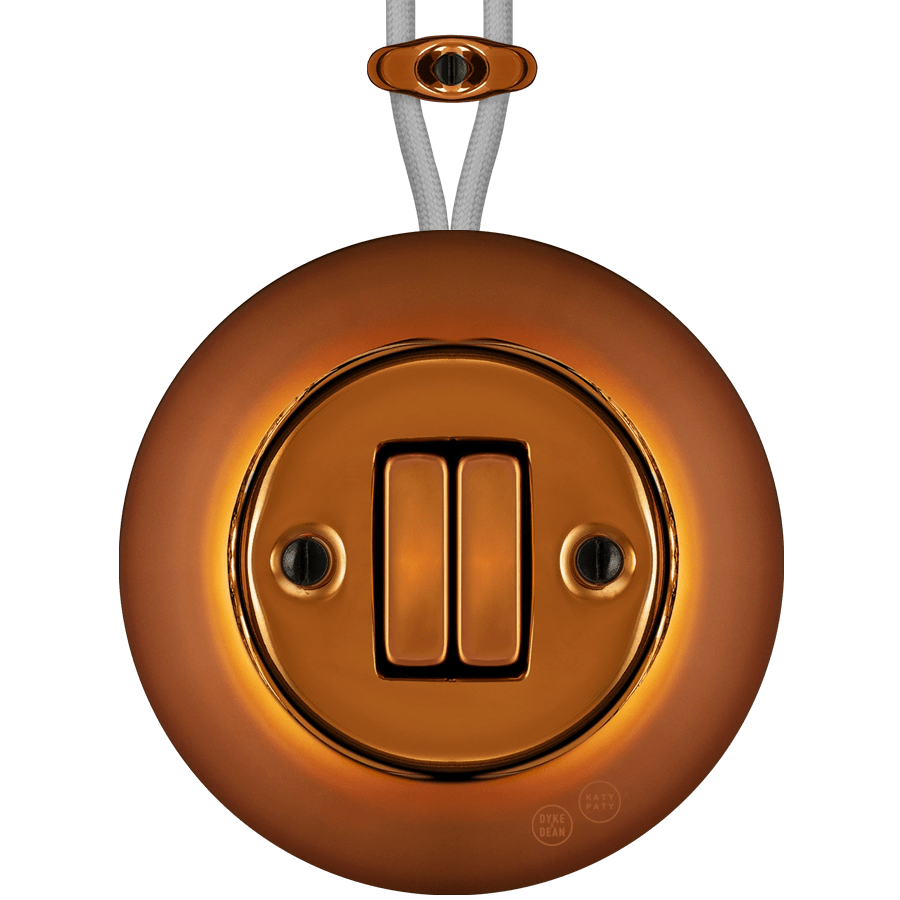 PORCELAIN KATY PATY COLONA ROUND SURFACE MOUNTED DOUBLE SLIM BUTTON SWITCH BRONZE - DYKE & DEAN