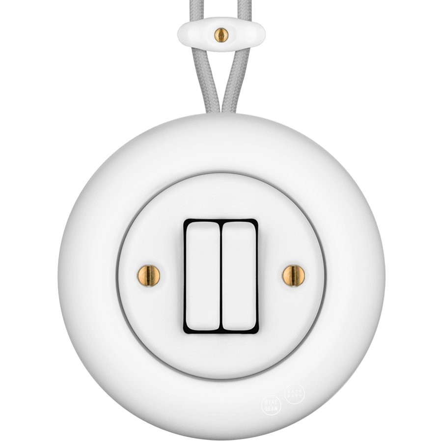 PORCELAIN KATY PATY COLONA ROUND SURFACE MOUNTED DOUBLE SLIM BUTTON SWITCH MATTE WHITE - DYKE & DEAN