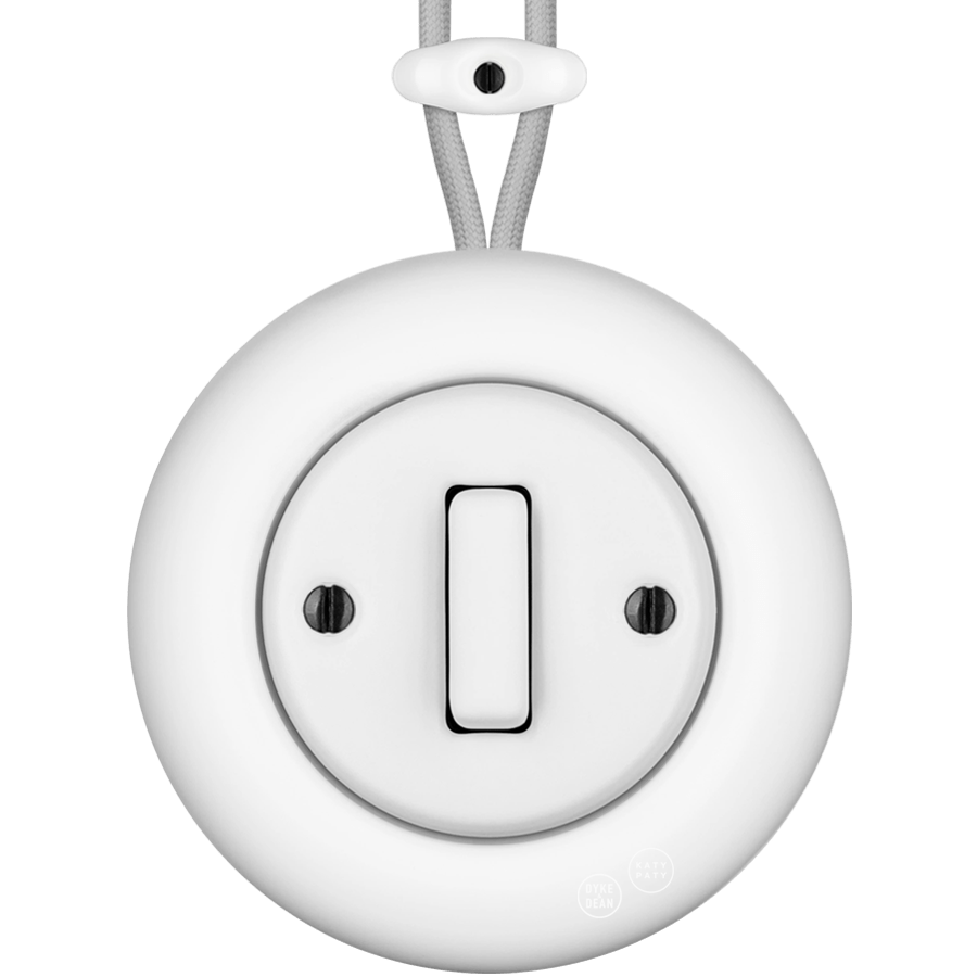 PORCELAIN KATY PATY COLONA ROUND SURFACE MOUNTED SLIM BUTTON SWITCH MATTE WHITE - DYKE & DEAN