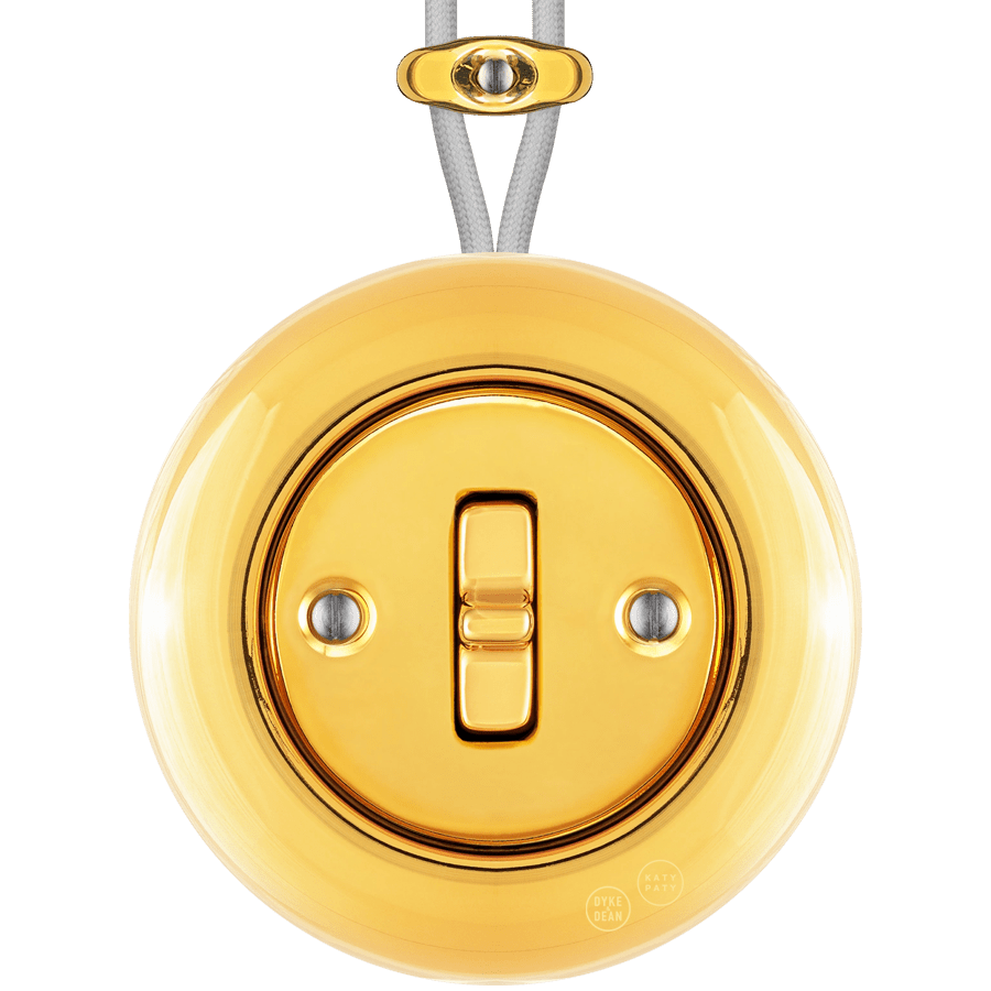 PORCELAIN KATY PATY COLONA ROUND SURFACE MOUNTED TOGGLE BUTTON SWITCH GOLD - DYKE & DEAN