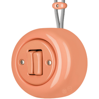PORCELAIN ROUND SURFACE MOUNTED DOUBLE SLIM BUTTON SWITCH SALMON PINK - DYKE & DEAN