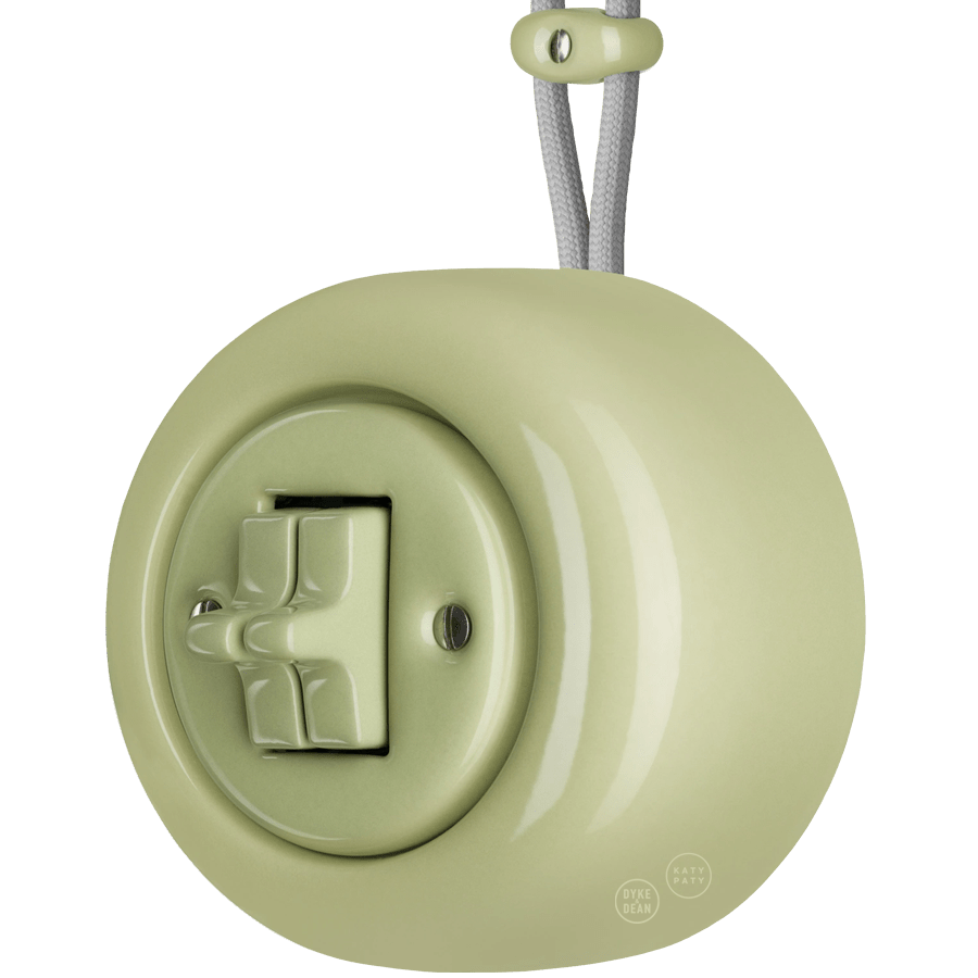 PORCELAIN ROUND SURFACE MOUNTED DOUBLE TOGGLE BUTTON SWITCH MOSS GREEN - DYKE & DEAN