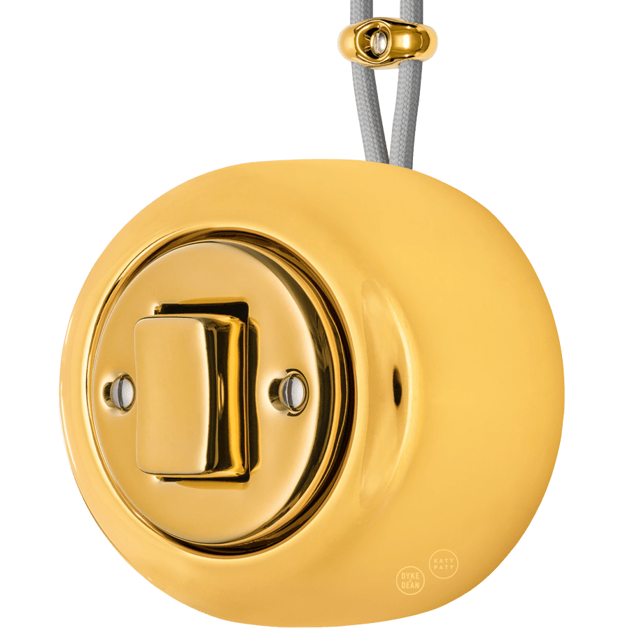PORCELAIN ROUND SURFACE MOUNTED FAT BUTTON SWITCH GOLD - DYKE & DEAN