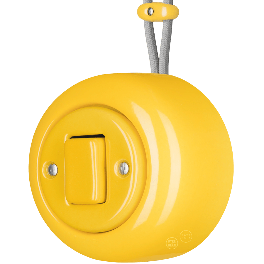 PORCELAIN ROUND SURFACE MOUNTED FAT BUTTON SWITCH YELLOW - DYKE & DEAN