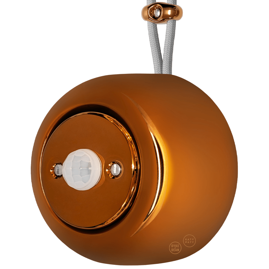 PORCELAIN ROUND SURFACE MOUNTED MOTION SENSOR BRONZE - DYKE & DEAN