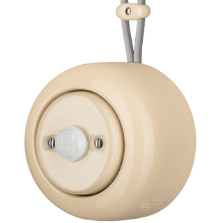 PORCELAIN ROUND SURFACE MOUNTED MOTION SENSOR SAND - DYKE & DEAN