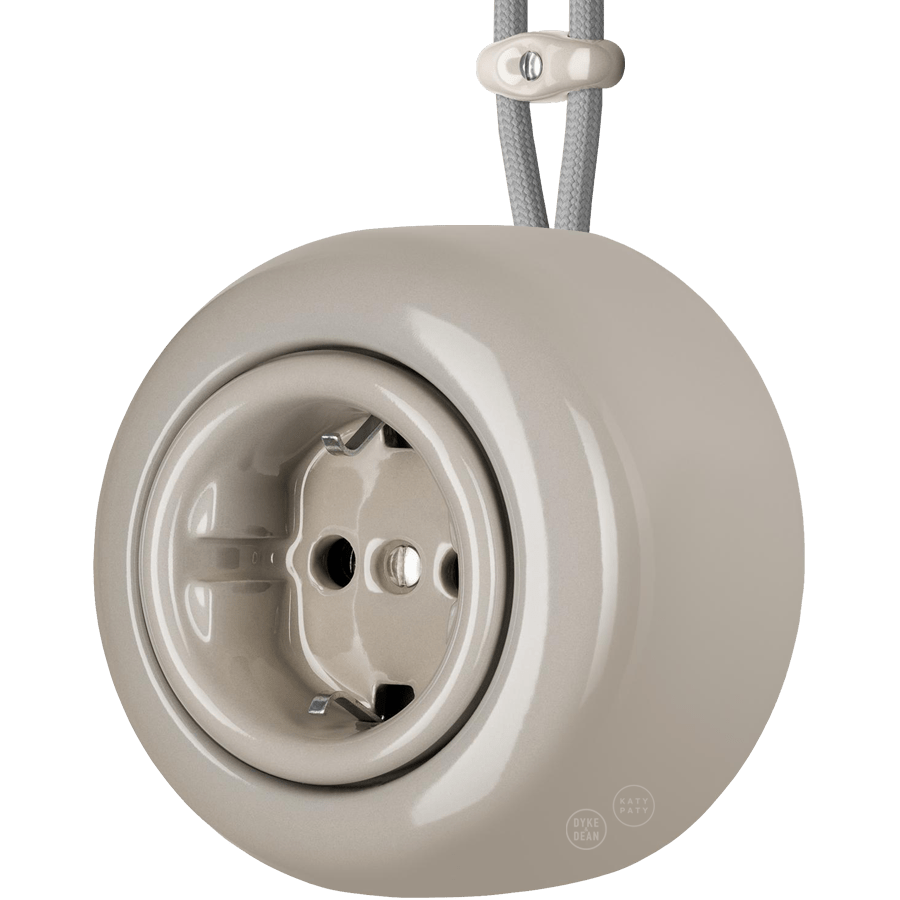 PORCELAIN ROUND SURFACE MOUNTED SCHUKO SOCKET CAPPUCCINO - DYKE & DEAN