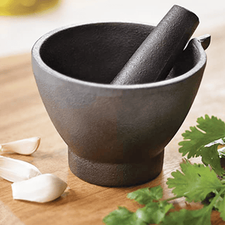 CAST IRON PESTLE & MORTAR - DYKE & DEAN