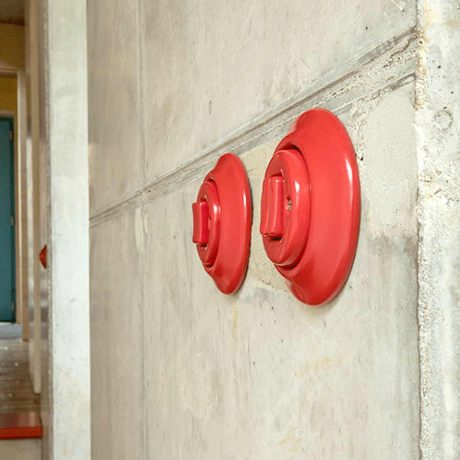 PORCELAIN WALL LIGHT SWITCH BRICK RED FAT BUTTON - DYKE & DEAN