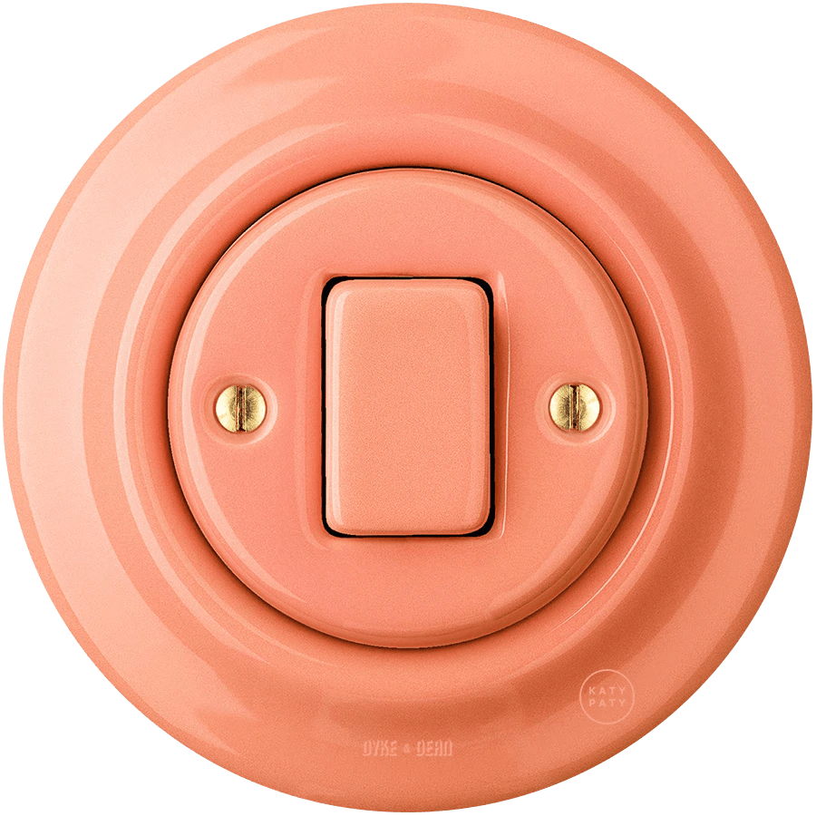 PORCELAIN WALL LIGHT SWITCH SALMON FAT BUTTON - DYKE & DEAN